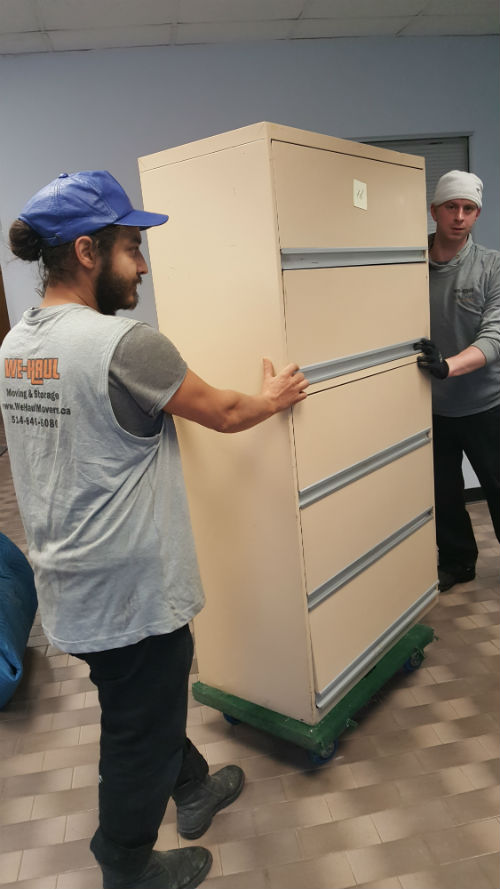 We_Haul_Movers_5832_Boulevard_Saint-Laurent_Montreal_Quebec_H2T1T3_Plateau-Mont-Royal_514-846-8080_cabinet_team_move.jpg
